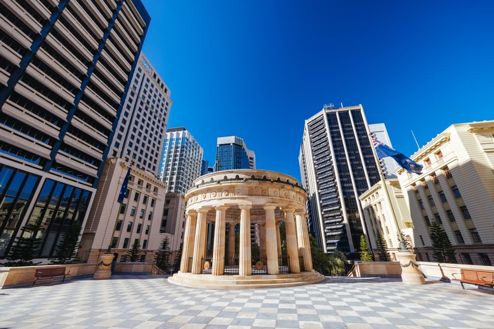 ANZAC Square's Shrine of Remembrance, a sandstone rotunda ringed by the Brisbane CBD towers.